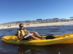 student in canoe